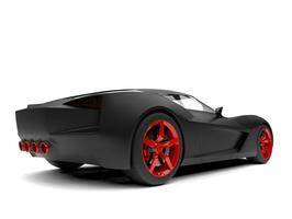 Matte black super sports concept car with red rims and details - back view photo