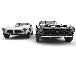 Beautiful black and white vintage sports cars photo