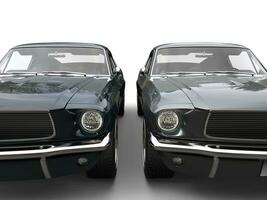 Beautiful gray and dark blue vintage American muscle cars - front view closeup shot photo