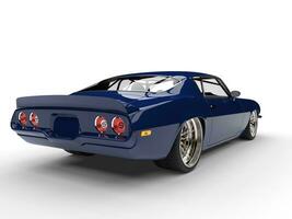 Cadmium blue vintage American car - back view photo