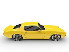 Daffodil yellow vintage American car - side view photo