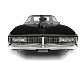 Pitch black American vintage muscle car - closeup shot photo