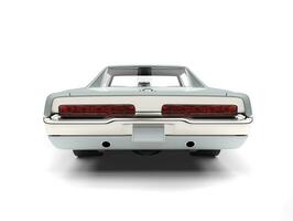 Bright silver American vintage muscle car - back view photo