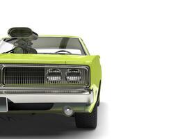 Lime green vintage American muscle car - extreme closeup cut shot photo