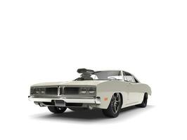Cream colored vintage American muscle car - front view photo
