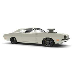 Cream colored vintage American muscle car - beauty shot photo