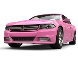 Pretty pink modern fast city car - closeup shot photo