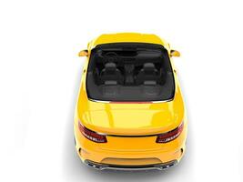 Cyber yellow modern convertible luxury car - top down back view photo