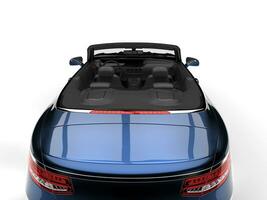 Metallic blue modern luxury convertible car - back view cut shot photo