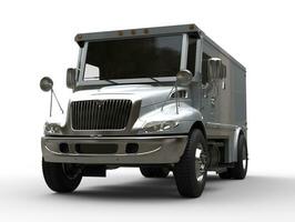 Silver armored cash transport truck - front closeup shot photo