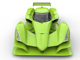 Crazy green modern super sports car - front view closeup shot photo