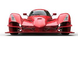 Angry red super race car - front view photo