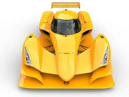 Burning yellow modern super sports car - front view closeup shot photo