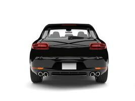 Cool modern family car - shiny black - back view photo