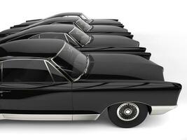 Row of awesome black vintage car - side view closeup shot photo
