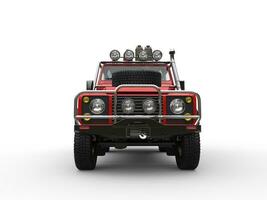 Red off road vehicle with all equipment - front view photo