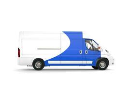 Big delivery van with blue decals on the sides and doors photo