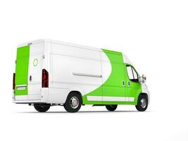 Big white delivery van with green details - tail view photo