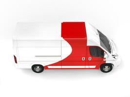 Big white delivery van with red details - top down view photo