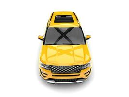 Bright lemmon yellow modern SUV - top down front view photo