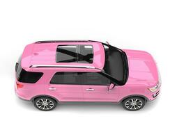 Candy pink big modern SUV car - top down side view photo