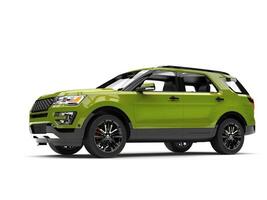 Fresh metallic green modern SUV car - low anle side view photo