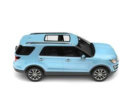 Modern pale blue SUV car - top down side view photo