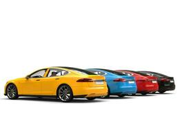 Modern electric sports cars in blue, red, yellow and black - rear view photo