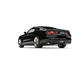 Crushing black modern sports muscle car - tail view photo