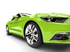 Screaming green modern super muscle car - front view extreme closeup shot photo