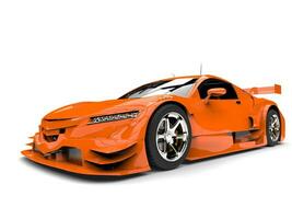 Modern orange race sports car - front closeup shot photo