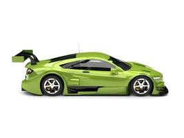 Metallic bright green modern super sports car - side view photo