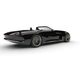 Midnight black modern convertible concept car - rear side view photo