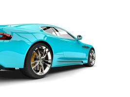 Baby blue modern luxury sports car - rear wheel closeup shot photo