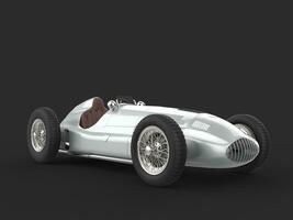 Old vintage race car in metallic silver color - beauty shot photo