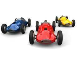 Red, blue and yellow old school vintage race cars photo