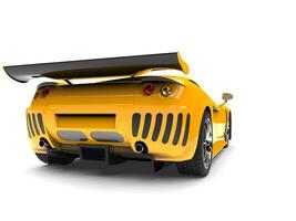 Beautiful yellow modern sport supercar - rear view photo