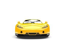 Beautiful yellow modern sport supercar - front view photo