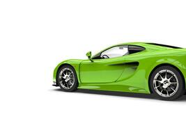 Chartreuse green modern fast sports super car - side cut shot photo