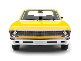 Canary yellow restored vintage muscle car - front view photo