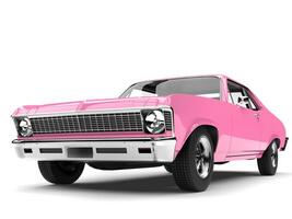Brilliant pink restored vintage fast muscle car - low angle shot photo