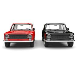 Red and black soviet era vintage cars side by side - front view photo