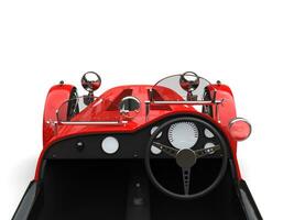 Bright red vintage open wheel sport racing car - driver seat view photo