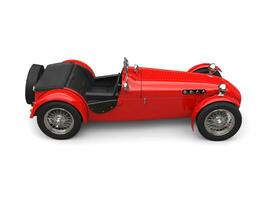 Bright red vintage open wheel sport racing car - top down side view photo