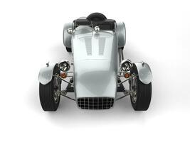 Vintage metallic silver open wheel sport racing car - front view photo