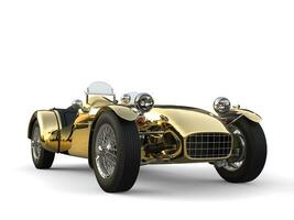 Golden vintage sport open wheel racing car - front view photo