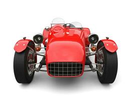 Bright red vintage open wheel sport racing car - front view closeup shot photo