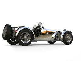 Chrome plated vintage sport open wheel racing car - back side view photo
