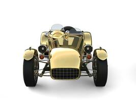 Gold plated vintage sport open wheel racing car - front view photo