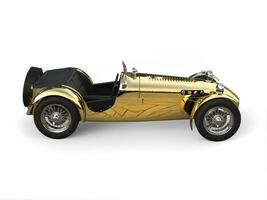 Gold plated vintage sport open wheel racing car - side view photo